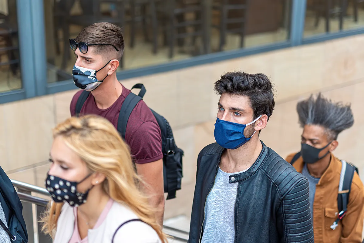 people-with-faces-covered-with-protective-masks