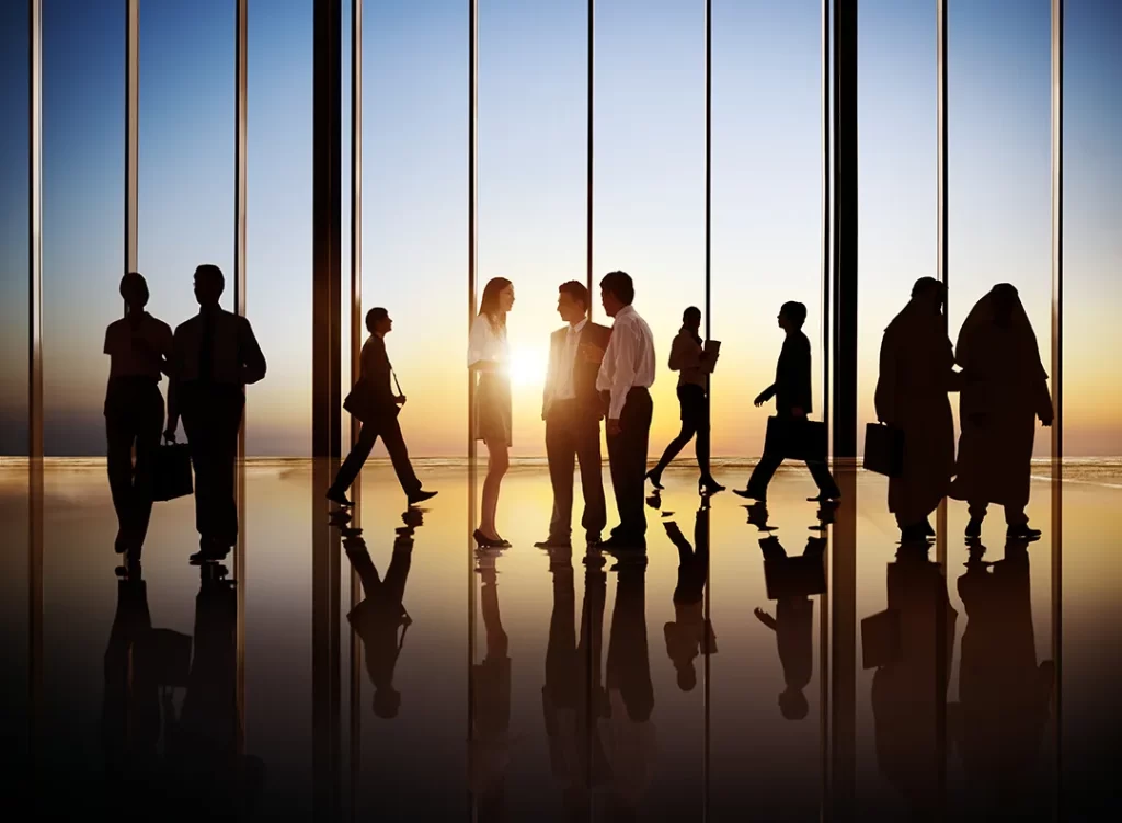 silhouettes of people in office-generic stock photo